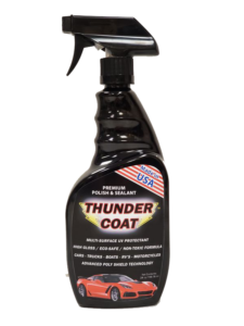 A black spray bottle labeled Thunder Coat for pet grooming.