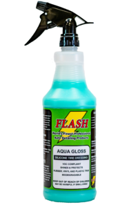 A bottle of Flash Aqua Gloss cleaning solution with spray nozzle.